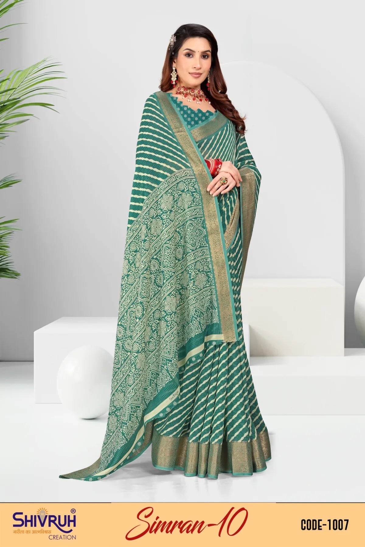 Hot saree in coral with stone-embellished blouse