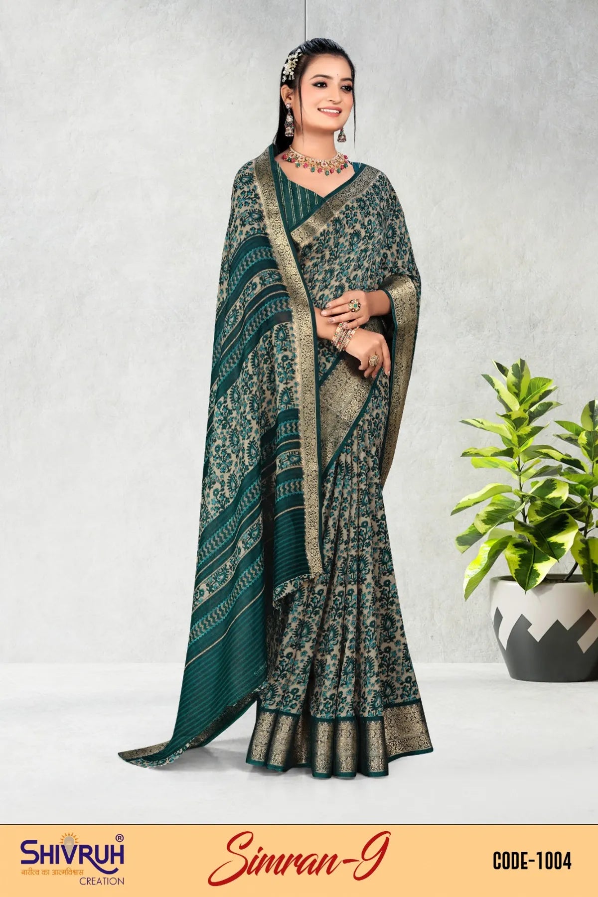 Designer saree look with pleated drape and statement earrings