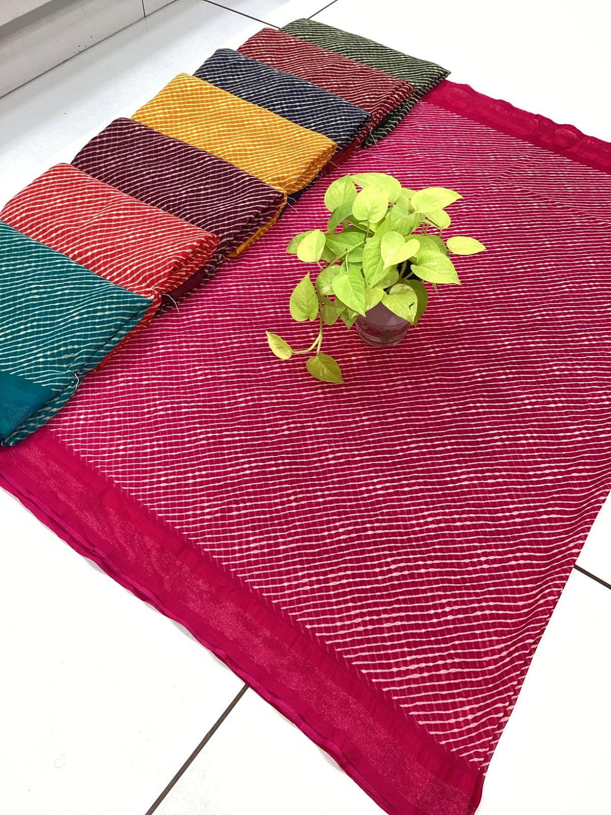 Yellow silk saree with handcrafted motifs