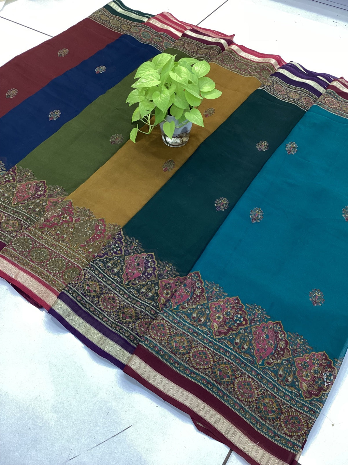 Saree blouse set with embroidery and boat neck design.
