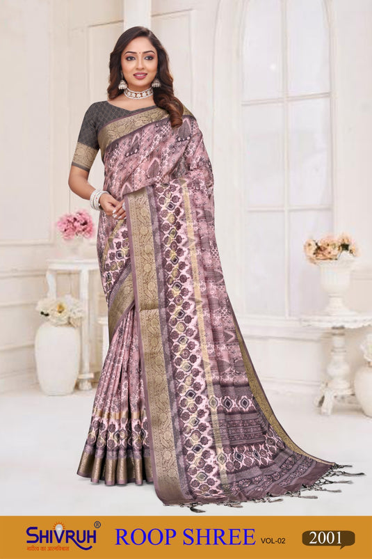 Wedding saree in rich maroon with zari detailing.