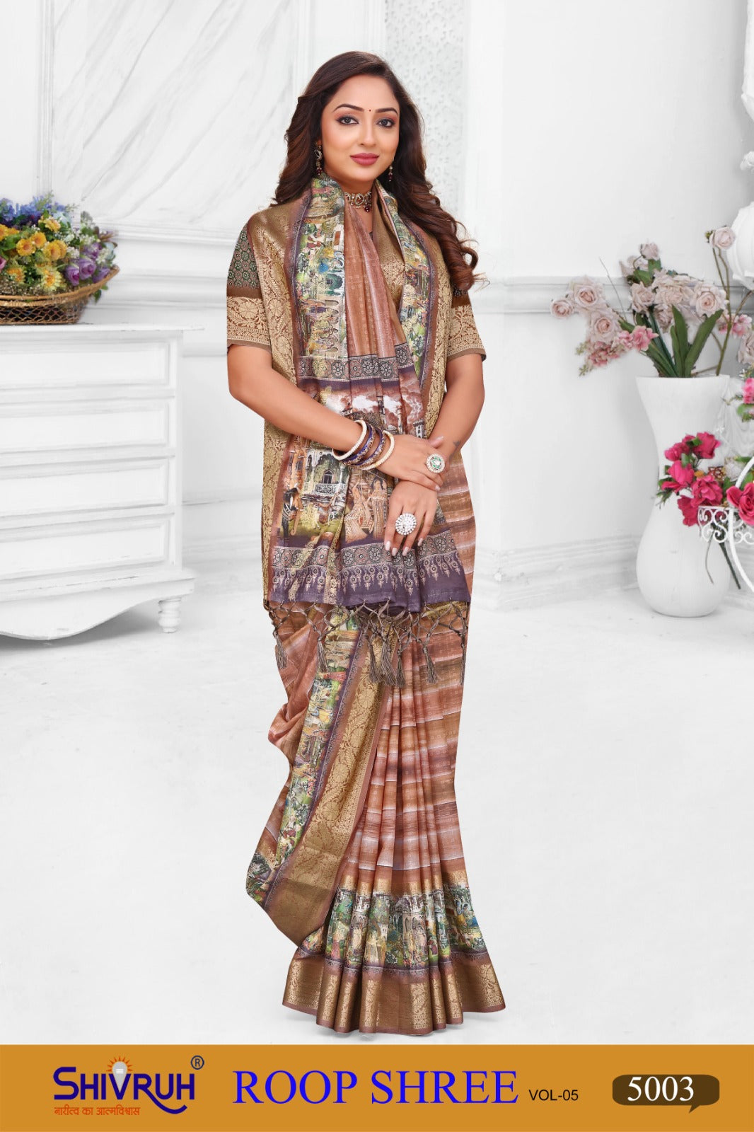 Designer green saree with gold embellishments from SHIVRUH.