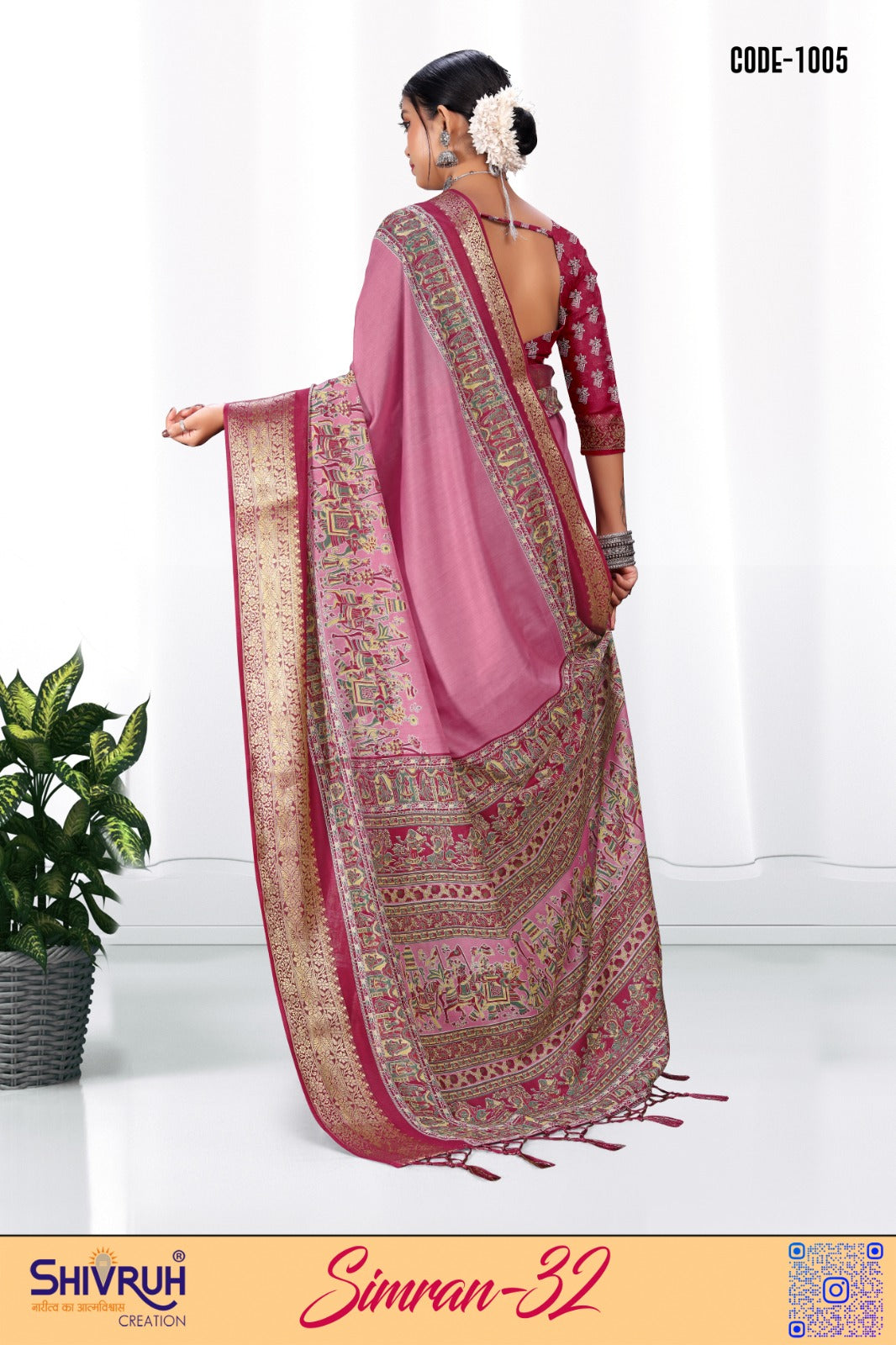 Women in lightweight cotton saree with bold saree colour and contemporary blouse design