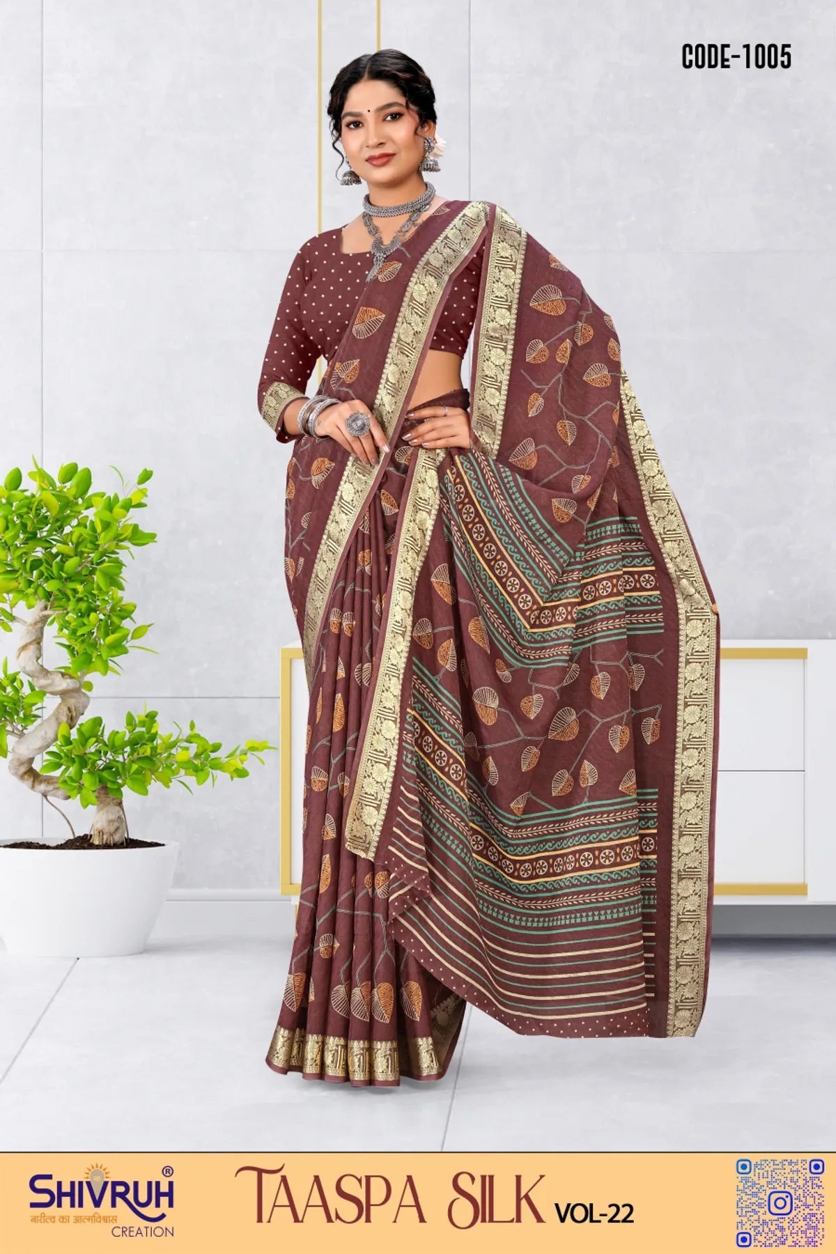 Saree design with gold foil print and tassels